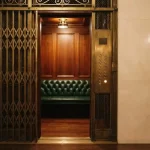 Vintage elevator with only the lowest buttons lit, illustrating the Bets.io review