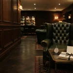 Stopwatch and sealed envelopes in a VIP lounge, reflecting the BitStarz review